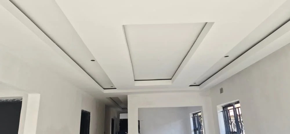 Modern recessed ceiling and interior finishing project by DC Designs and Construction